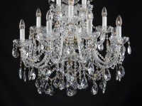 The richly decorated lower part of the chandelier