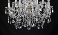 Detail of the lower part of the chandelier - how the crystal chains and pendants are connected