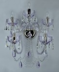 Large crystal wall light for illuminating home entrance areas