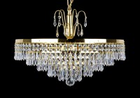 Detail of the lower part of a basket chandelier made of polished brass decorated with crystal drops