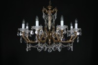 Massive crystal chandelier made of cast brass hung with French crystal trimmings