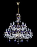 A larger modern chandelier with blue crystal pendants