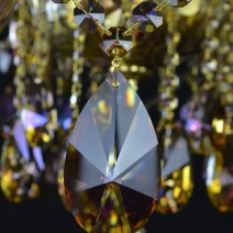 Sample of two color versions of crystal chandeliers made of vacuum-plated crystal - amber VS sky blue