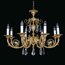 A design set of massive crystal chandeliers and lamps composed of similar brass castings