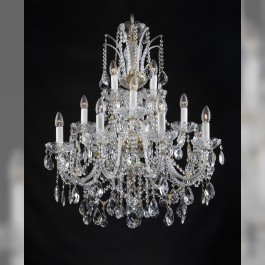 Larger crystal chandelier with 16 glass arms densely decorated with crystal almonds