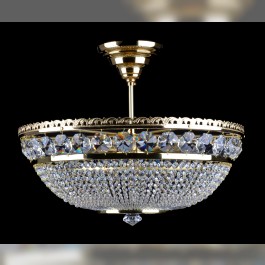 A simple strass chandelier in the shape of a basket with a ceiling rose and a suspension rod.