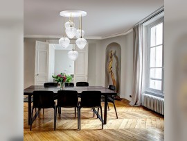 Chandelier with glass hearts in a meeting room