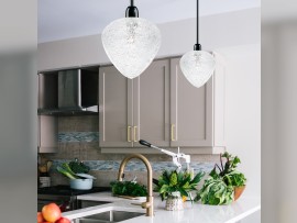 Chandelier with glass hearts above the kitchen counter