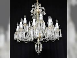 15-arm Baccarat chadnelier with crystal prisms, matt gold brass