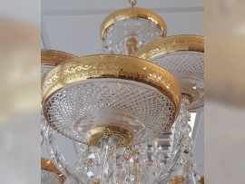 Detail of gilded bowl of the 16-arm chandelier