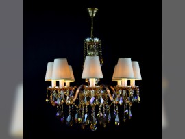 Amber plated chandelier with 8 arms and lampshades lit