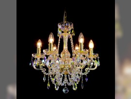 A sky blue chandelier made of plated crystal with a shade of blue soap bubbles lit