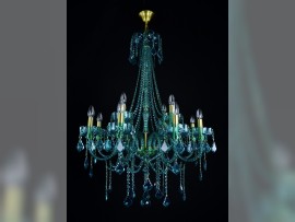 Decorative blue-green crystal chandelier with golden brass tubes