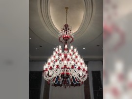 Ruby chandelier in fully lit state