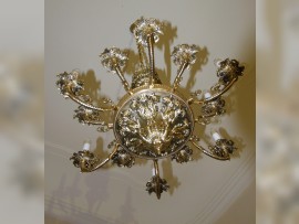 The lower part of the chandelier is made of massive brass castings