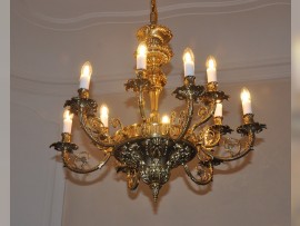 Luminous 12-arm gold cast chandelier