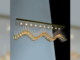 Wave chandelier with a strip of amber balls A