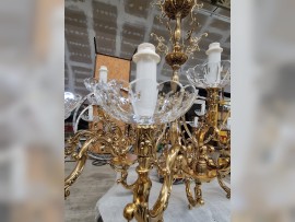 Large had-cut light bowl of the chandelier from below