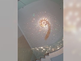 View of the amber spiral of the chandelier from below