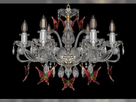 Detail of a crystal chandelier with red butterflies