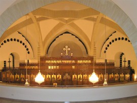 View of chandeliers hanging from the high ceiling of the church 1