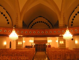 View of chandeliers hanging from the high ceiling of the church 3