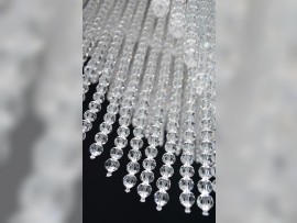 Cut glass pearls hanging from the chandelier