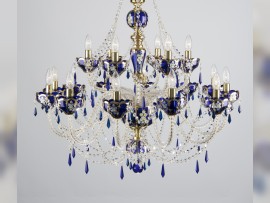 The lower half of a luxurious blue chandelier.