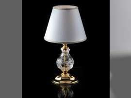 A classic clear crystal table lamp with a lampshade