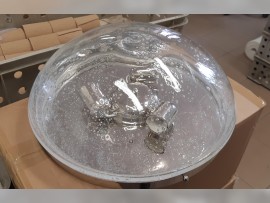 Silver surface mounted light with glass with bubbles