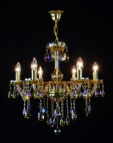 6-arm chandelier made of plated crystal in the shade of amber lit