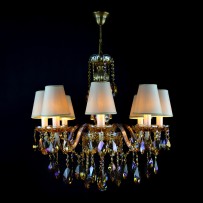 Amber plated chandelier with 8 arms and lampshades lit