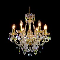 A sky blue chandelier made of plated crystal with a shade of blue soap bubbles lit
