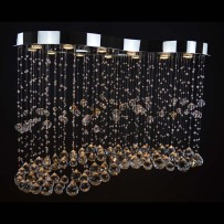 hiny silver design of a larger 12-bulb chandelier - dark background