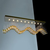 Wave chandelier with a strip of amber balls A