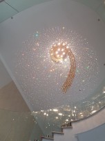 View of the amber spiral of the chandelier from below