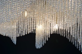 Detail of glass beads and metal of a modern light fixture