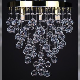 Chandeliers with a round mirror with crystal balls arranged in a cone shape - apartment & business interiors