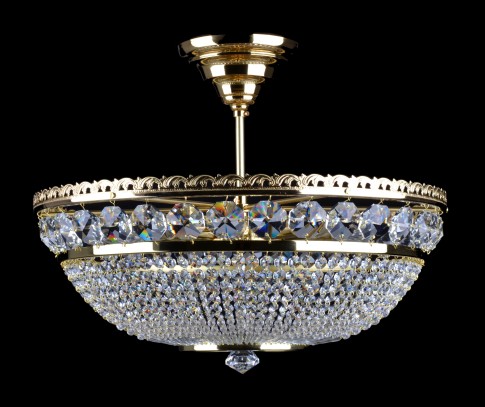 A simple strass chandelier in the shape of a basket with a ceiling rose and a suspension rod.